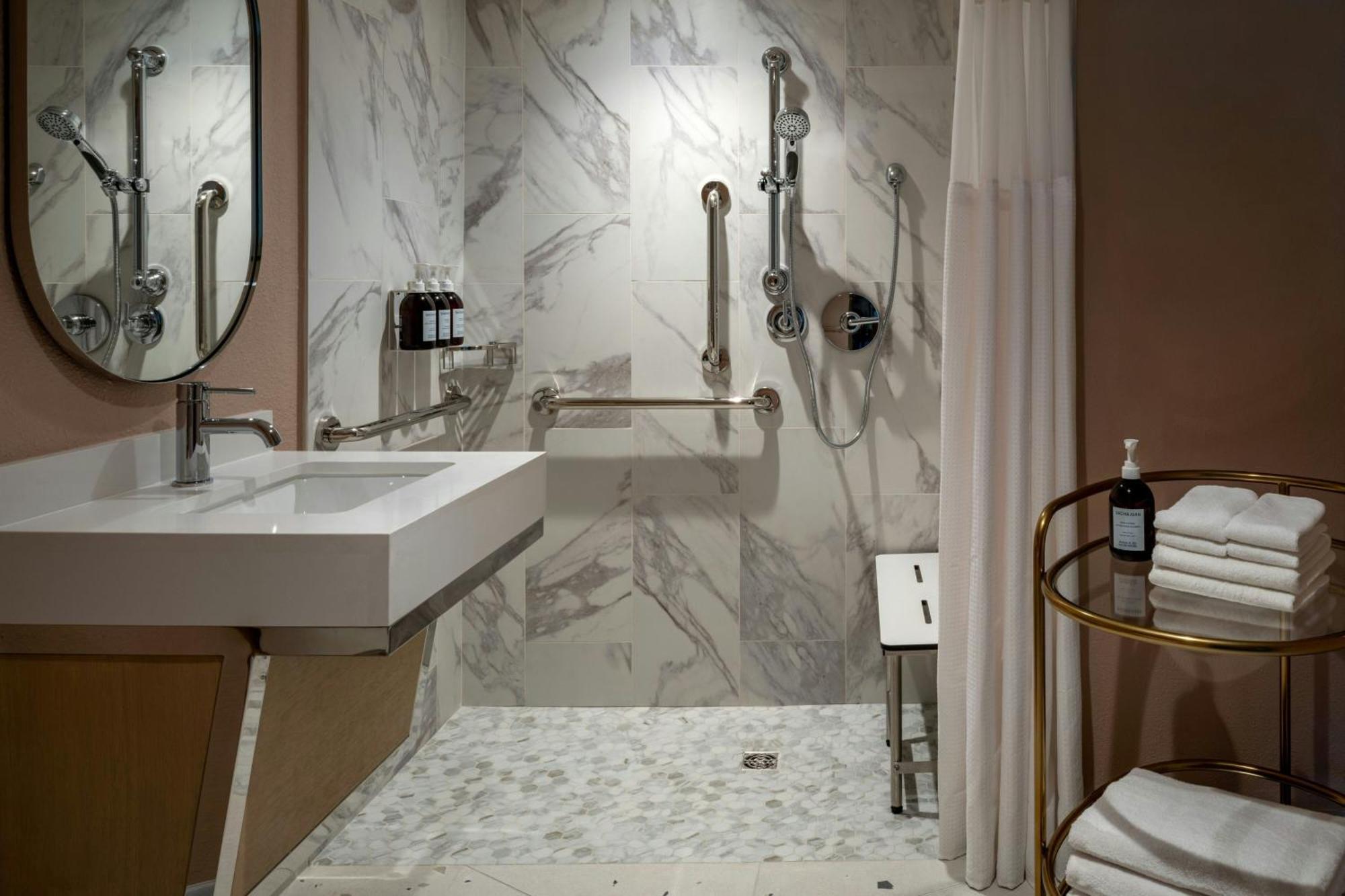 King Room Courtyard View Roll Shower Mobility Accessible